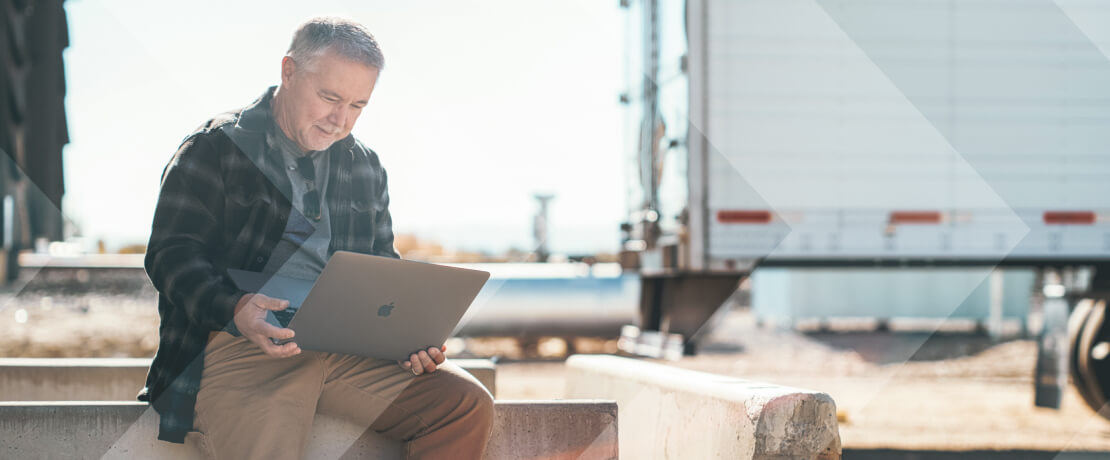 Carrier on his laptop