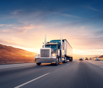 truck on road at sunset