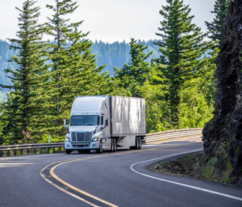 Truck on a winding highway.