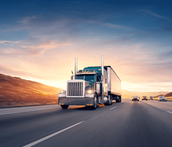truck on road at sunset