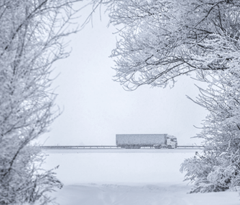 Truck on a snowy road.