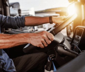 Driver holding the steering wheel.