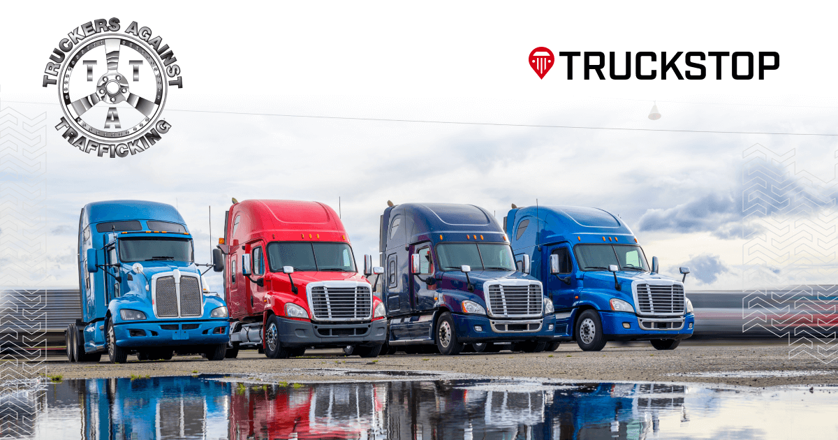 four trucks lined up with truckers against trafficking and truckstop logo