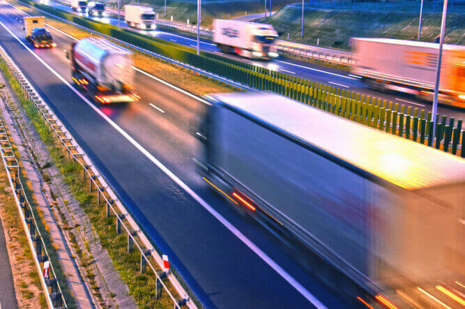 Trucks rushing on road