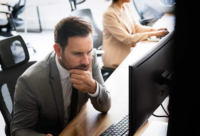 Broker reviewing forcast.